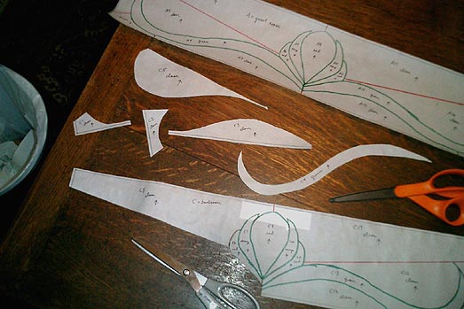 Cutting the paper patterns for the guest room and bathroom transoms (the dining room transom is already built).